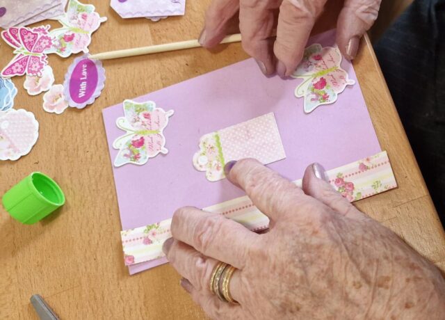 someone making a card