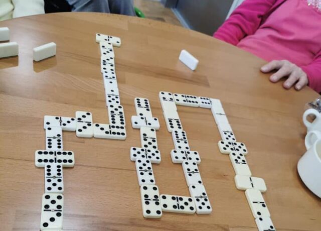 a game of dominos on a table